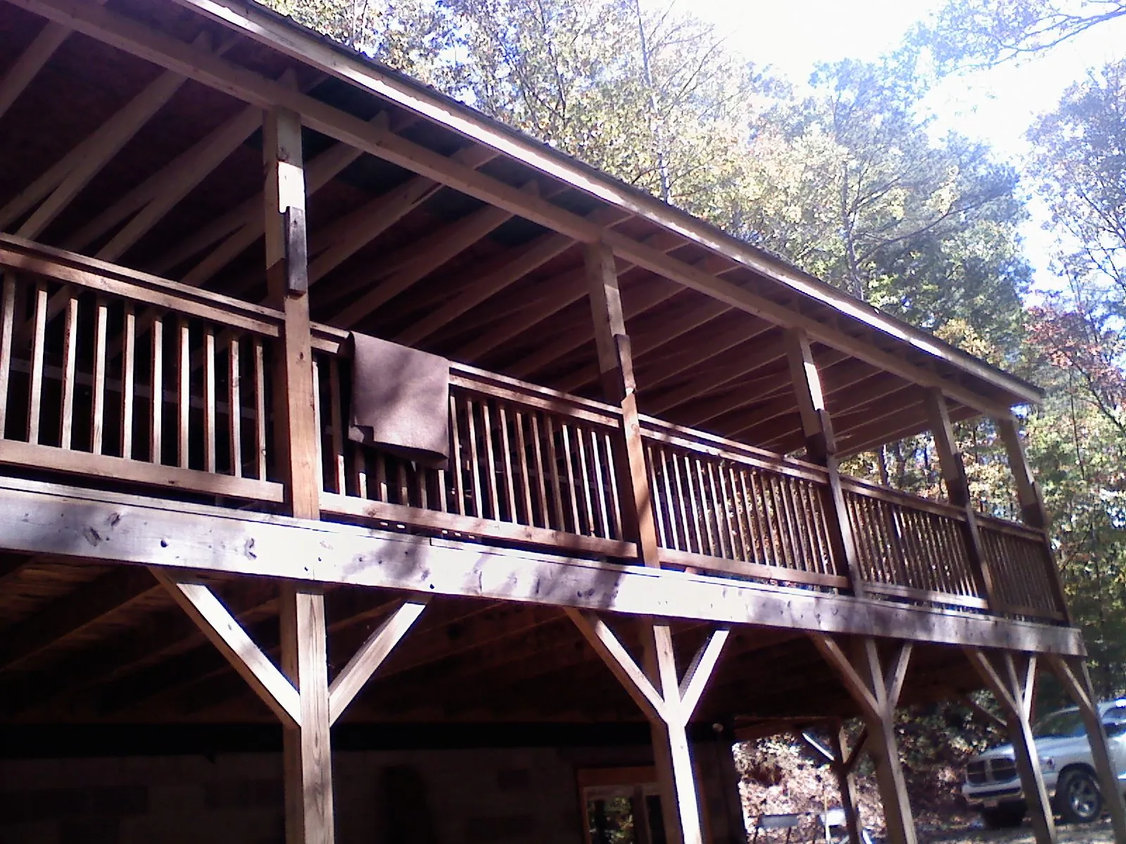 Timber framing under a new elevated porch and deck — Roof Leak Repair in Logsden by Roofing Brothers